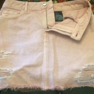 A pink jean skirt made by divided size 10 us